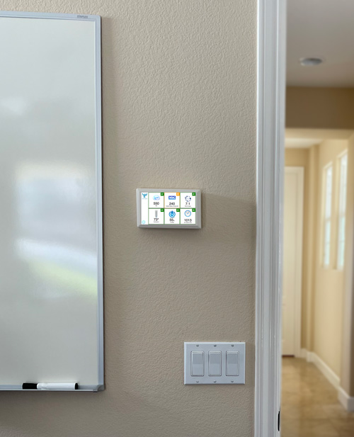 Hummingbird Indoor Air Quality Monitor on wall example